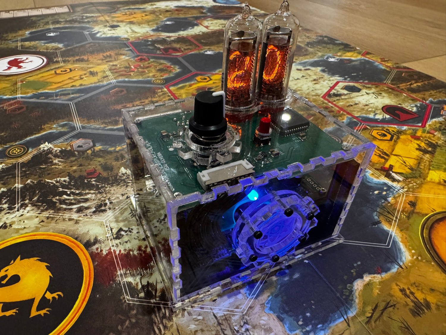 Quantum Entropy Engine: Adventurer in clear acrylic enclosure with blue LED, displaying 20 on nixie tubes, on a board game - isometric view.
