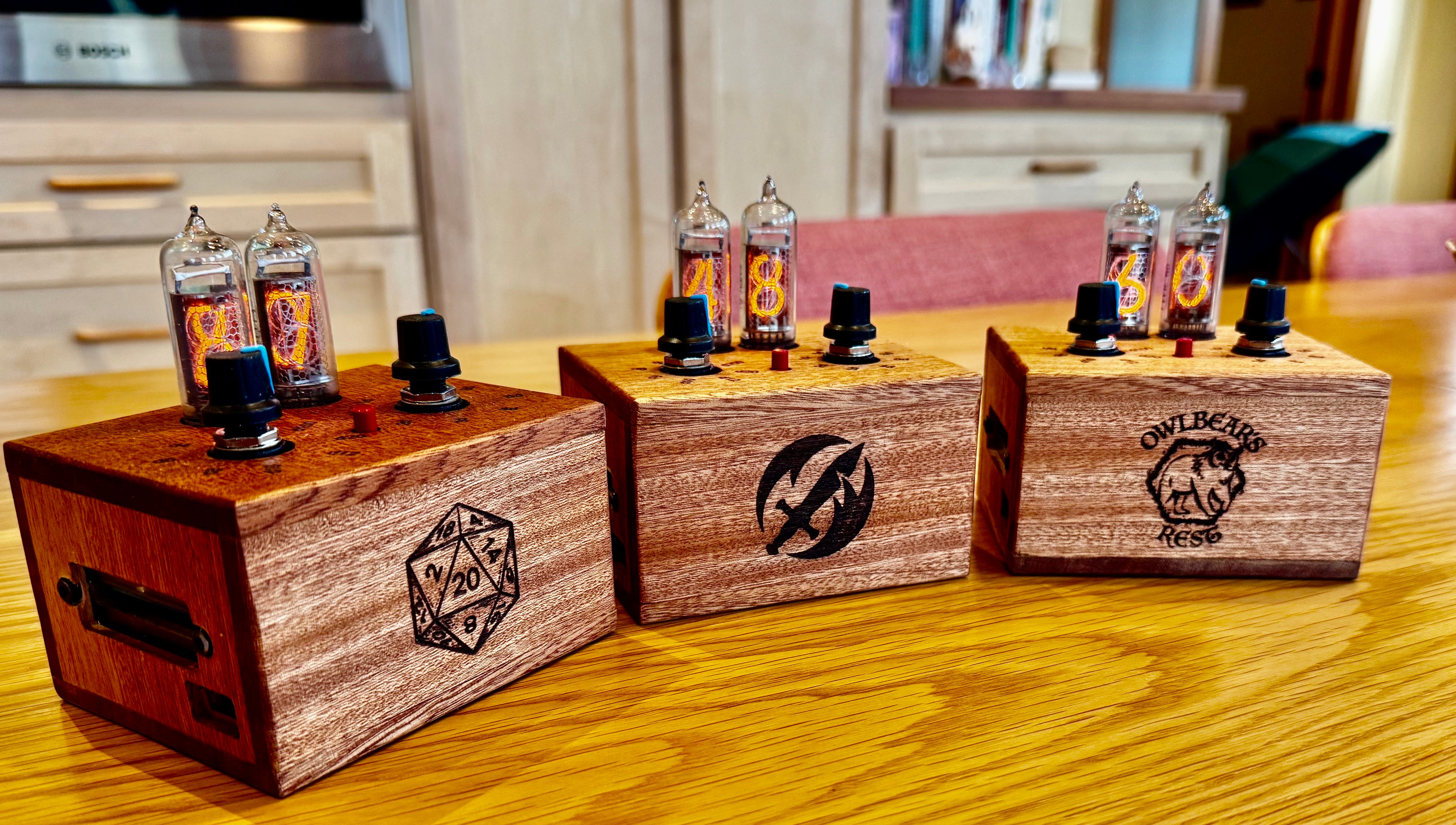 Three quantum entropy engines sitting on a wood table. 