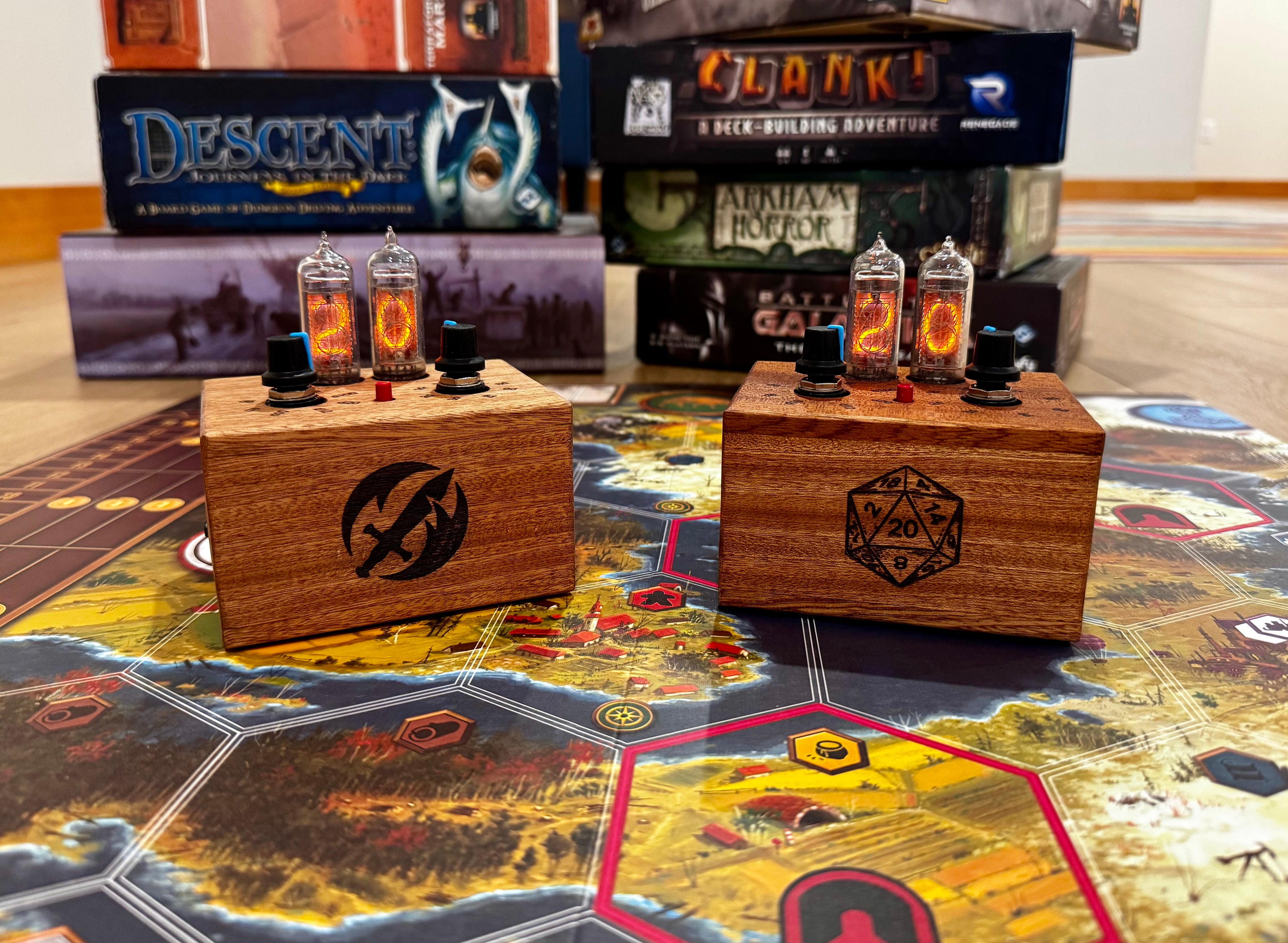 Wooden quantum random number generators sitting on a board game, with board games in the background. 